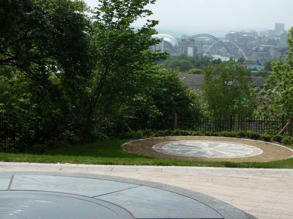 To the foreground is a circular feature tabletop, a terrace and a lower circular performance space. The backdrop is a great view of the Tyne Bridge. Click image for more details.